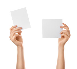 Obraz premium Female hands with blank papers on white background