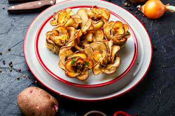 Baked potatoes in bacon