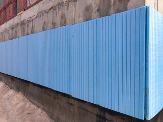 Obraz premium Waterproofing and thermal insulation of concrete building walls