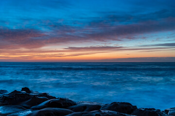 High Cloud Sunrise Seascape from Rock Platform