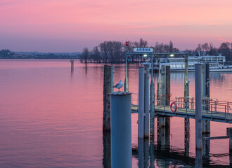 Colorful sunset over the lake, romantic view from the pier.Arona,Piedmont, italian lakes, Italy.