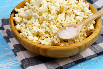 popcorn background with sea salt. close-up selective focus