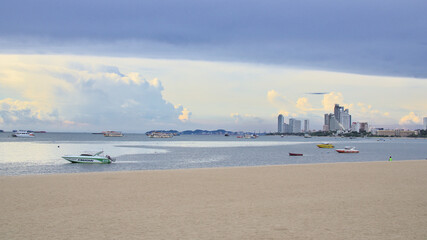 A scenic view of the famous  Pattaya white sand beach in Thailand. 