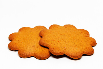 two gingerbread cookies on white background