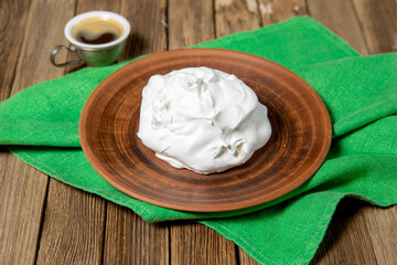 French vanilla meringue cookies on wooden background