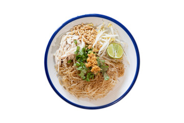 Dry chicken noodle in white plate on isolated white background with clipping path. Top view.