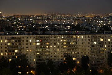 Obraz premium Light in the houses of the sleeping area at night. Moscow, Russia.