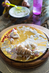 Keeping cake slices in a container. After birthday party.