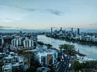 City view after rain - Rain water on window glass in Brisbane, Queensland, Australia - Rainy...