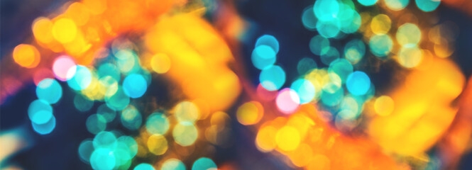 Colorful background with natural bokeh texture and defocused sparkling lights. Teal and orange...