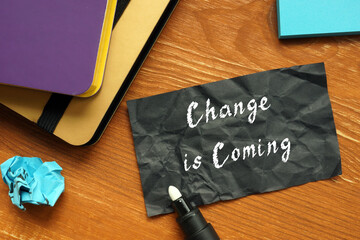 Financial concept about Change is Coming with phrase on the page.