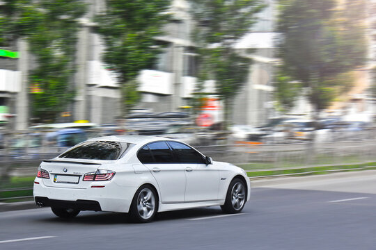 Kiev, Ukraine - May 13, 2014: BMW 520 F10 in the city. Diesel car. Car in motion
