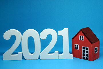 Mockup House 2021 on ฺBlue background - new year trend 2021 - blue pattern business concept of Real Estate, Home Property for Sale and rent - copy space