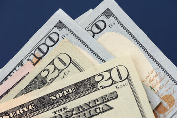 Many american dollar banknotes. Symbolic photo for debt and wealth.