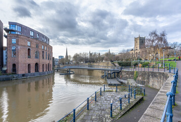 A beautiful view of the Bristol buildings next to a river in South West England