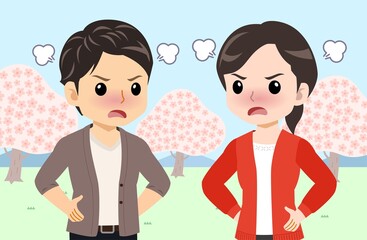 Young men and women in front of Sakura in spring