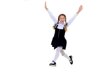 Fototapeta na wymiar Smiling schoolgirl happily jumping high