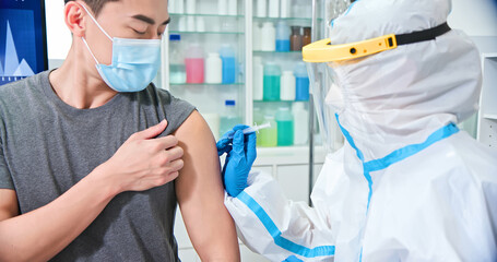 nurse making a vaccination
