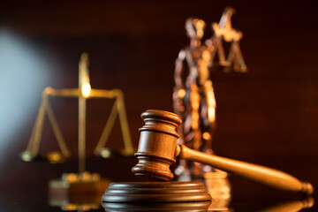 Law and justice concept. Law symbols composition: judge’s gavel, Themis  statue and scale.