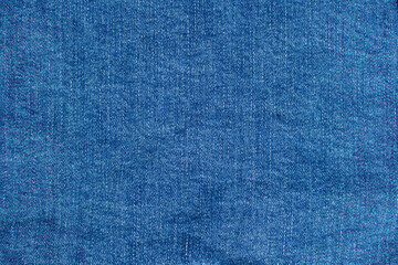 Denim light blue jeans fabric texture background