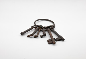 old iron keys on white background