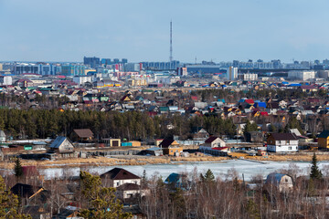 Aerial view of Yakutsk skyline with TV tower and center of the city in the evening - 401954310