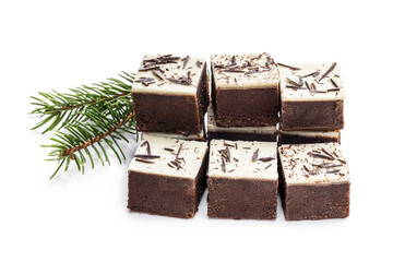 Chocolate brownie bites with sparklng chocolate topping isolated on white