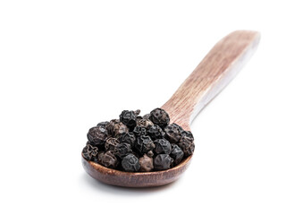 Black pepper corn in wooden spoon isolated on white