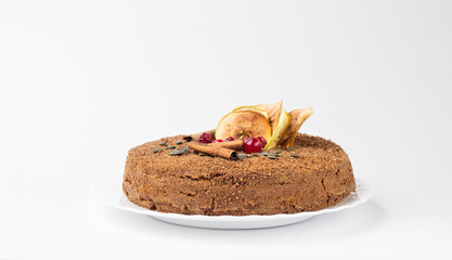 Nut cake without gluten, without eggs and milk with creamy Apple filling on a white background.