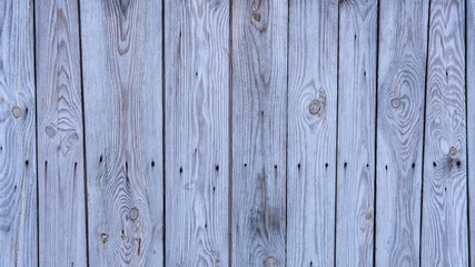 Vertical grey and old wooden planks with nails. Can be used to print style vinyl backgrounds with wood structure. Vintage wooden background. Close up view. 