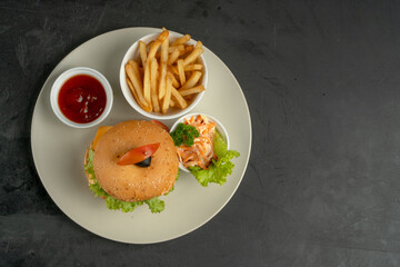 Classic Burger Meal with Fries, Salad, and Ketchup