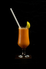 Fresh fruit juice on black background 