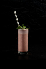 Fresh fruit juice on black background 