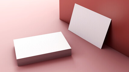 Naklejka premium Business cards mockup in a pile and resting on a wall. Minimal branding and stationery design concept. Blank visit card to insert design for presentation