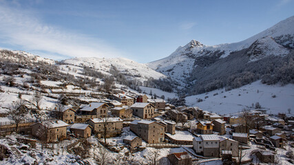 Fototapeta na wymiar Small village in a snowy mountain, Picos de Europa