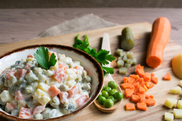 Russian traditional salad. Salad made of boiled vegetables and mayonnaise.
