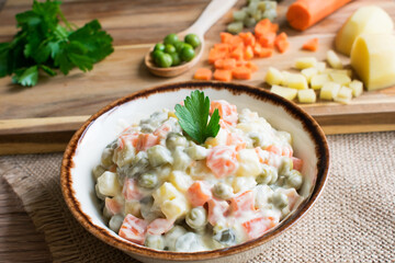 Russian traditional salad. Salad made of boiled vegetables and mayonnaise.
