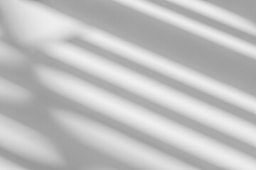 Fototapeta premium Abstract shadow and striped diagonal light background on white wall from window, architecture dark gray and sunshine diagonal geometric effect overlay for backdrop and mockup design