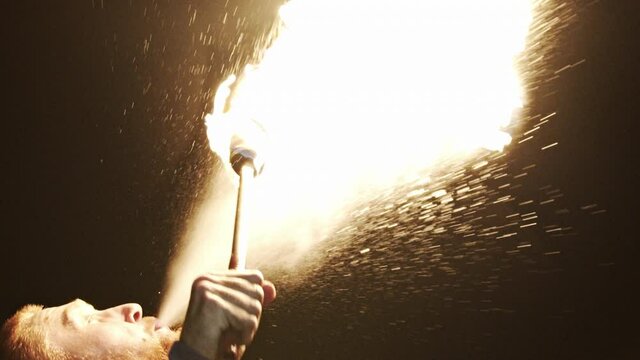 Man breathes fire during his solo show in Tallinn, Estonia