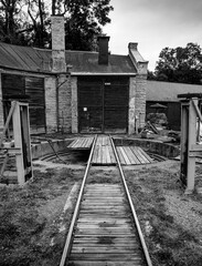 Fototapeta na wymiar old railroad tracks and a locomotive carousel