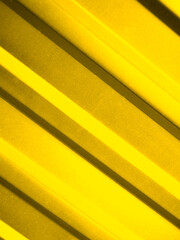 Metal yellow wall close up. presentation of fashion colors 2021