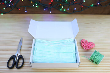 Gift box with protection mask in it
