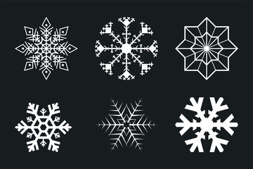white snowflakes set isolated on black background