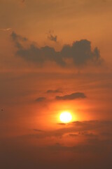 Sunset with trishula in clouds