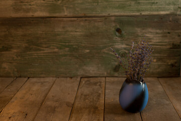 Lavender bouquet on a wooden background.