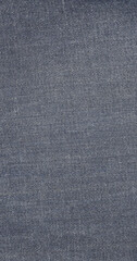 Fototapeta na wymiar Denim texture in close up view with copy space for vintage background or wallpaper. Blue jeans pattern no seam with macro style to preset about classic fashion cloths concept. Indigo color fabric.