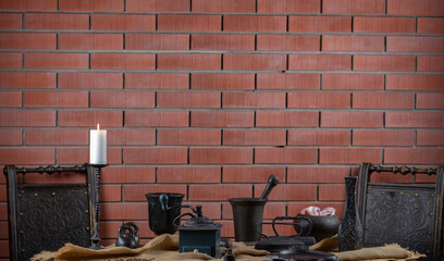 Antique coffee maker and old cast iron kitchen utensils on canvas
