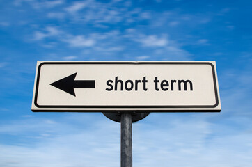 Short term road sign, arrow on blue sky background. One way blank road sign with copy space. Arrow on a pole pointing in one direction.