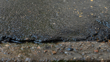 Soft raining and water drop on ground. Rain is liquid in the form of droplets. Abstract background. Space for text.