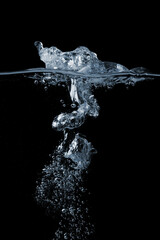 Water bubbles on a black